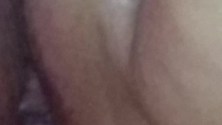 Close-up trying to piss