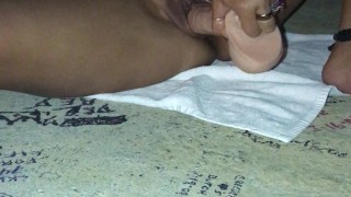 Asian fucking her toy with nipple clamps