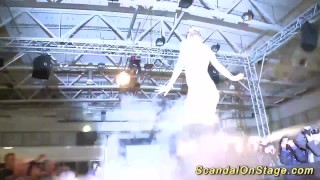 wild busty babe squirt on public stage