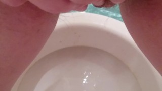 Hairy pussy piss and mastrubating on public toilet