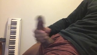 BIG LATINO COCK STROKES AND CUMS ALL OVER HIMSELF.