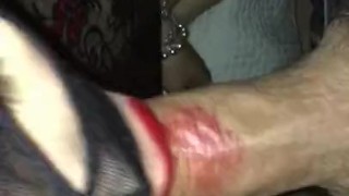 Red lipstick on husband cock
