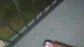 Playing with my cock on the balcony