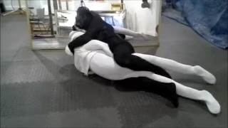 black meshed frogman vs white spandex and spiderman dummy