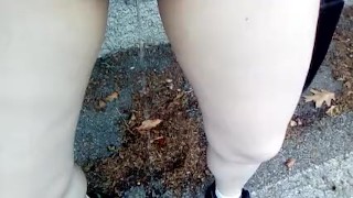 Pee in shorts on the street while it rains