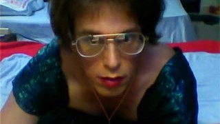 Shemale Lydia in green dress brown pantyhose and red heals with long dildo
