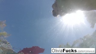 Olivia Austin has some summer fun in the pool
