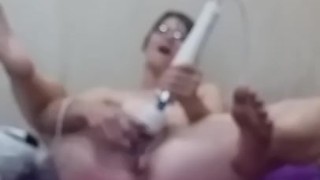 Shycollegeslut creams and squirts with a glass dildo and hitachi