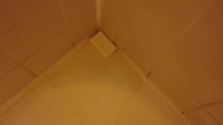 Washing a bar of soap with piss in the hotel shower