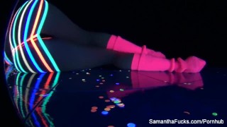 Colorful blacklight teasing with Samantha Saint