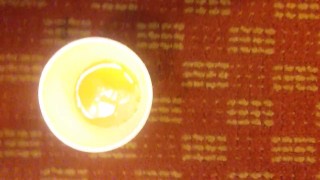 Look at my pussy pissing in a cup for you!