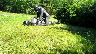 frogman humps an enemy frogman outside