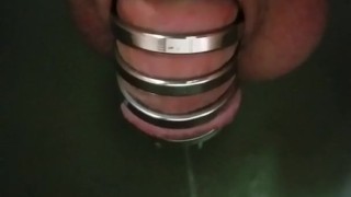 Man peeing sitting locked in chastity cage!