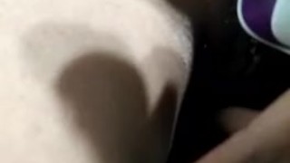 Masturbating