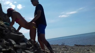 Real amateur doggystyle on the public beach. Outdoors sex.