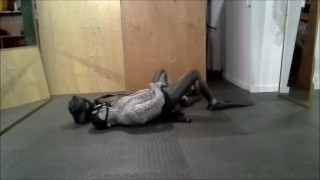 zentai snake in a wetsuit