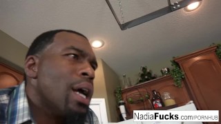 Steaming hot interracial threesome in the kitchen