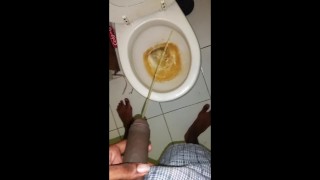 Black teen boy pissing
