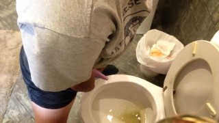 Having a blast taking a leak with the go girl penis!