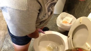 Having a blast taking a leak with the go girl penis!
