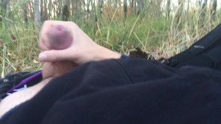 Young twink jerking off, cums in public park