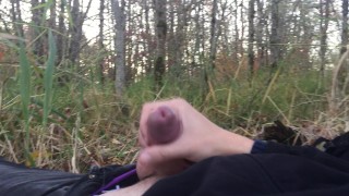 Young twink jerking off, cums in public park