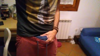 Hot guy jerks off and cums in front of a mirror