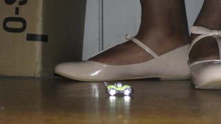 A Crossdresser in Flats - Dominating a Tiny Car in Nude Mary Jane Flats