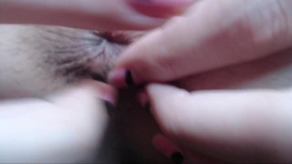 Amatuer fingering her tight asshole in close up