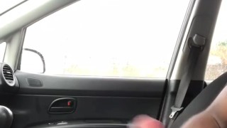 Stroking my black cock in the car - public