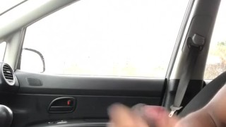 Stroking my black cock in the car - public