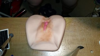 Male sex toy with triple cumshot.