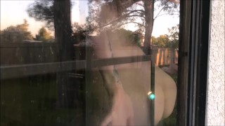 Teen shows off naked body for peeping neighbor