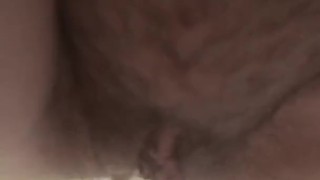 Hot, horny, hairy pussy taking a piss in the bathtub.