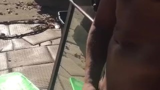 Jacking off in front yard