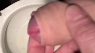 Stroking my Cock before taking a Piss