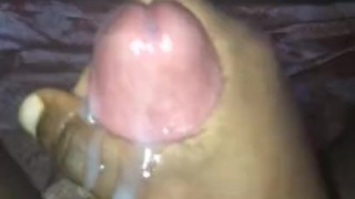 Masturbating