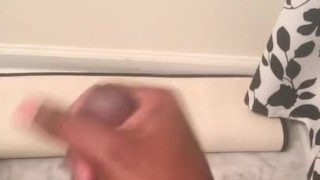 Stroking cock in the bathroom