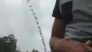Aussie Pissing Outdoors While Rock Hard