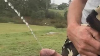 Aussie Pissing Outdoors While Rock Hard