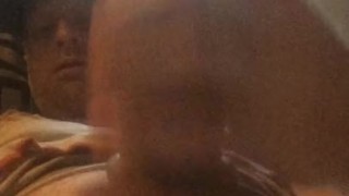 Stroking wearing cockrings.