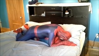 spiderman plays with his dummy spiderman