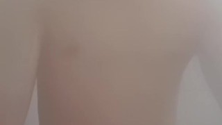 Asian guy showering and playing big dick