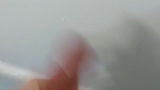 Cumming in shower with cockring on