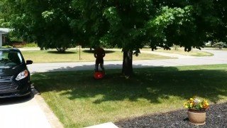 Mowing the lawn in short shorts