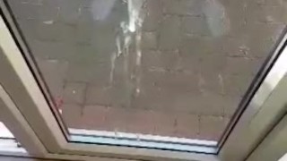 Shooting a huge load against the window