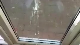 Shooting a huge load against the window