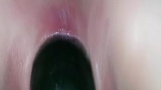 Naughty Nicole rides a huge cucumber