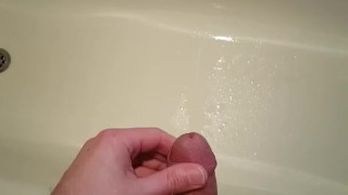 Pissing then a huge cumshot