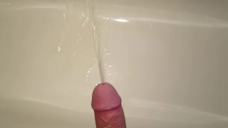 Pissing then a huge cumshot